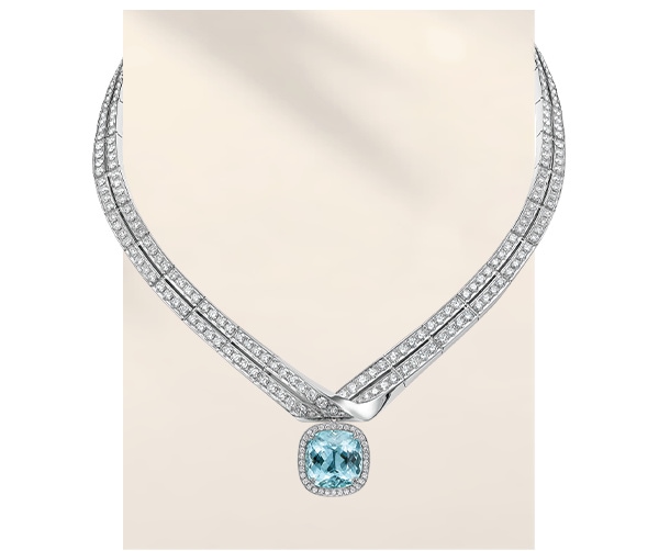Weave: a bamboo-weaving-inspired V-shaped necklace with a gemstone pendant